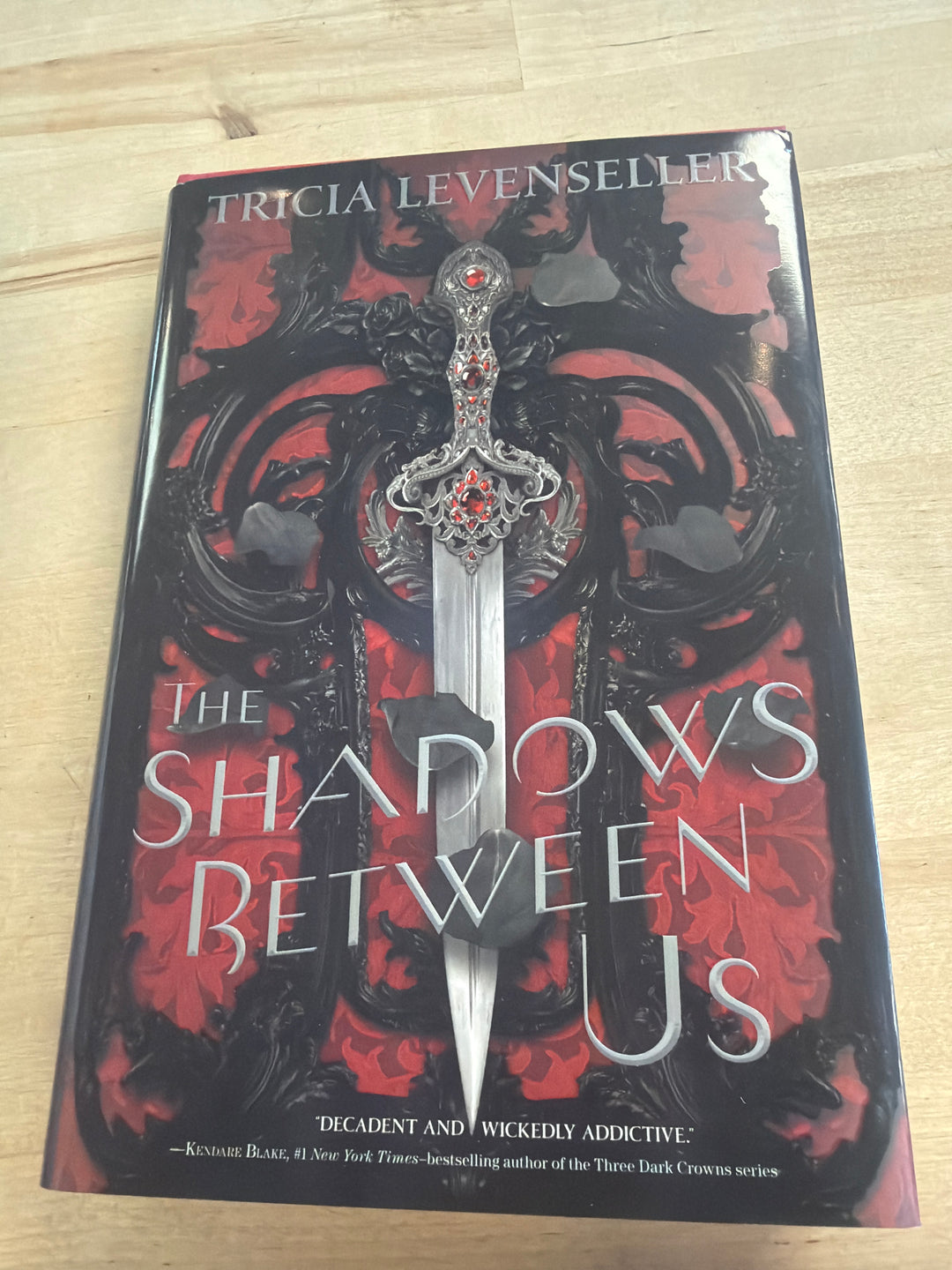 The shadows between us by Trina levenseller