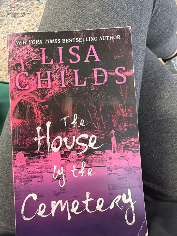The house by cemetery by Lisa Childs