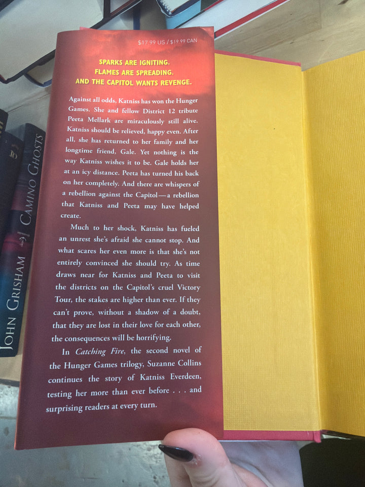 Catching fire by Suzanne Collins