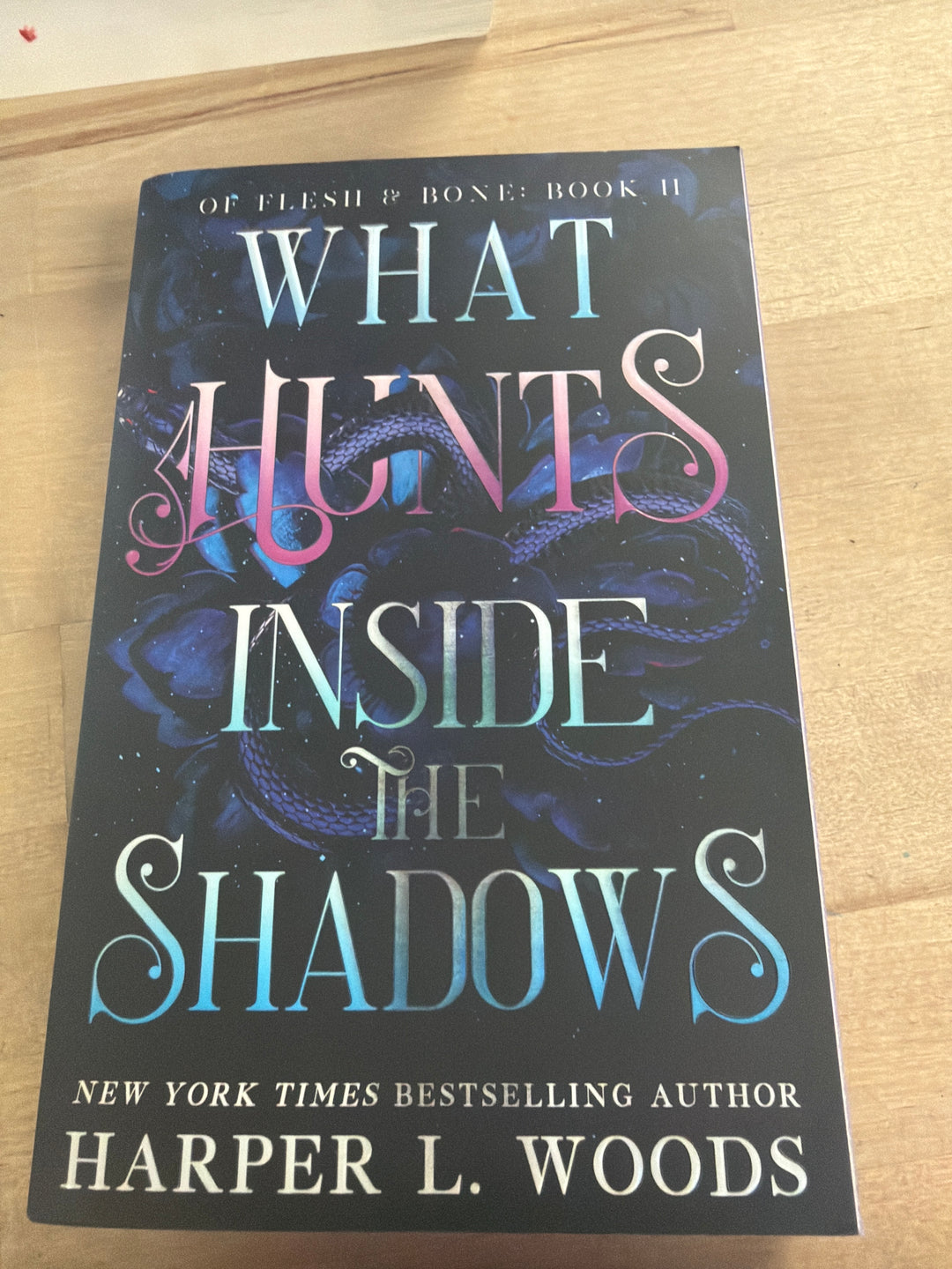 What hunts inside the shadows by Harper L woods