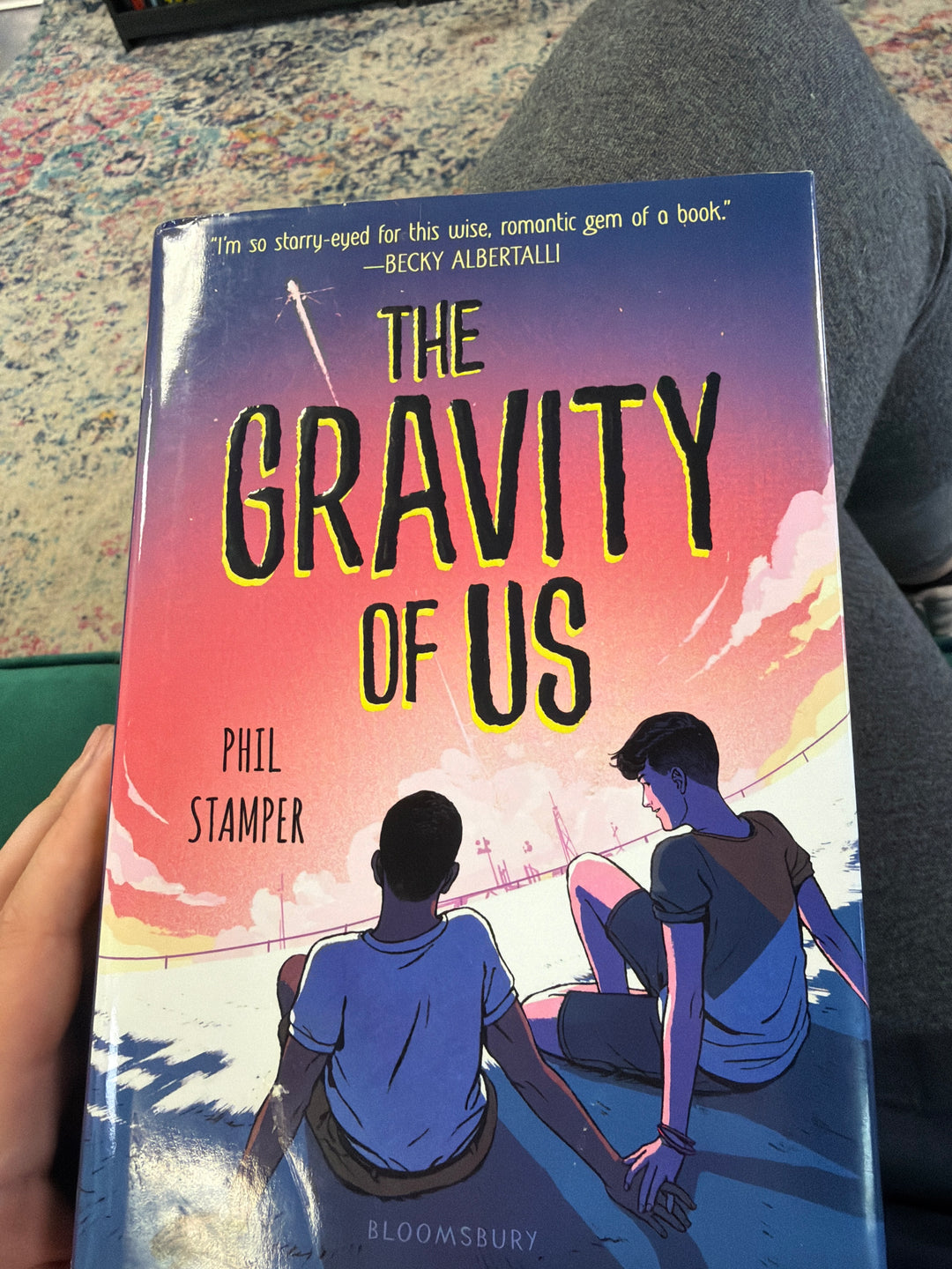 The gravity of us by Phil Stamper