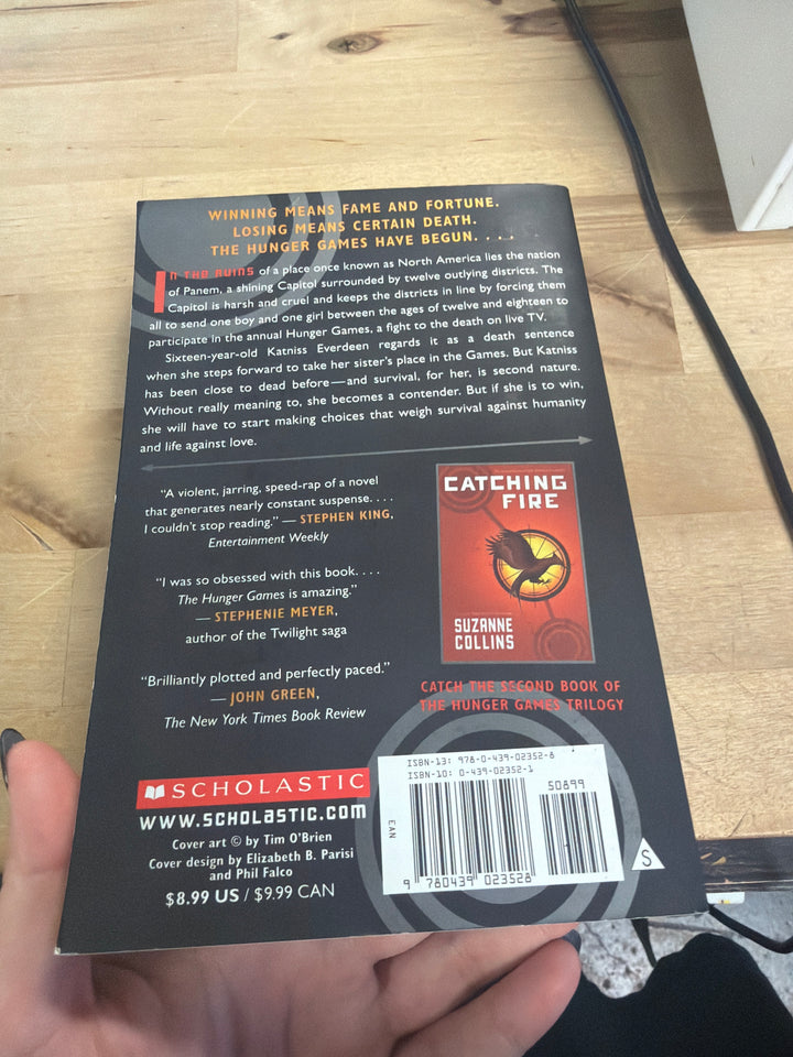 The hunger games by Suzanne Collins