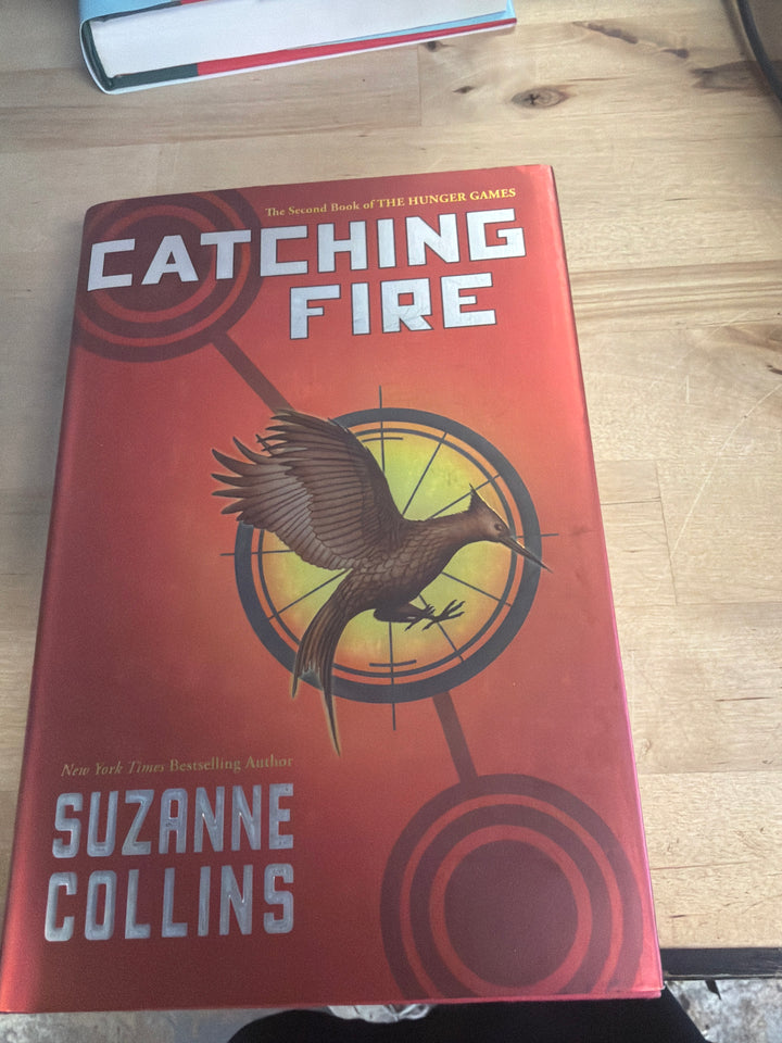 Catching fire by Suzanne Collins
